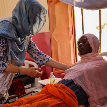 Anhar Hassan Mohammed Omar, 29 years old, lives in the Jir South neighborhood of Nyala. She faced many challenges, including not having enough money to reach the hospital. She worked 16-hour shifts continuously to cover the costs of treatment and nutrition from the beginning of her pregnancy until her ninth month. She arrived at Nyala Teaching Hospital, underwent a C-section, and received all the necessary medical services. She mentioned that many pregnant women in this critical period lack proper healthcare and expressed her deep gratitude to all the staff.